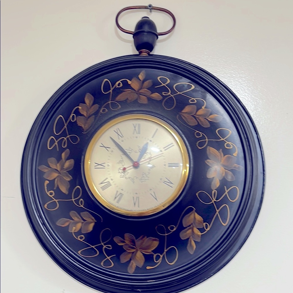 Elegant Black and Gold Wall Clock